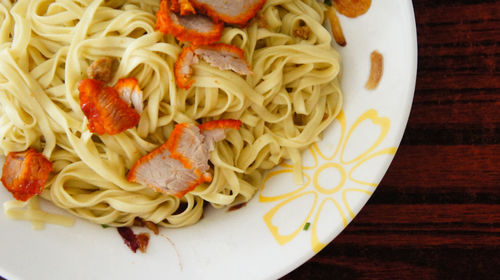 Close-up of noodles in plate on table