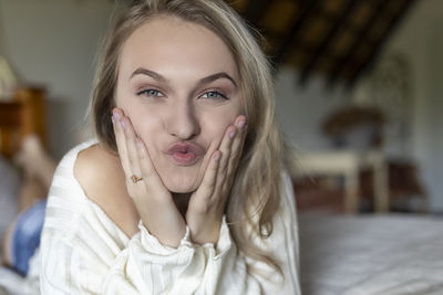 Portrait of beautiful woman at home