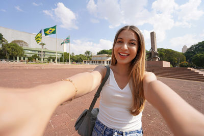 Self portrait of beautiful brazilian tourist girl in goiania, goias, brazil