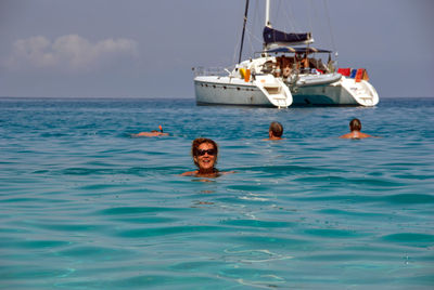 Man swimming in sea