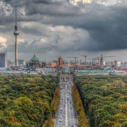 City street against cloudy sky