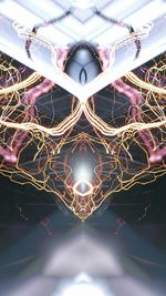 Low angle view of illuminated ferris wheel