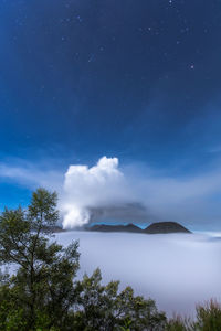 Scenic view of sea against sky at night