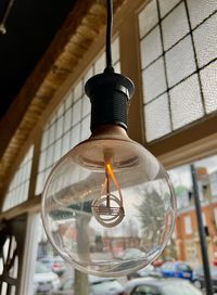 Close-up of illuminated light bulb