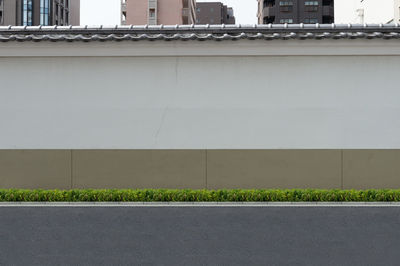 Low angle view of building by street