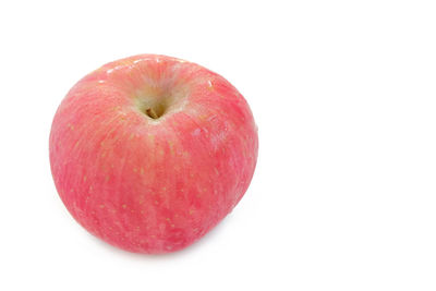 Close-up of apple against white background