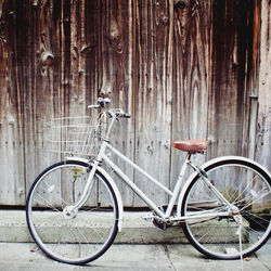 Bicycle parked in front of building