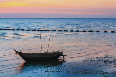 Scenic view of sea at sunset