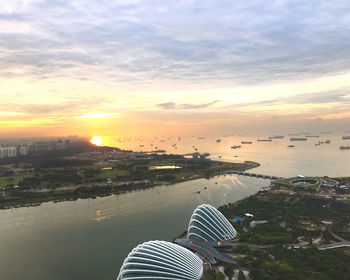 High angle view of cityscape against sky during sunset