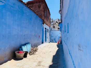 Alley amidst buildings in city