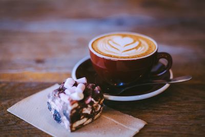 Close-up of cappuccino on table