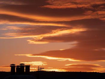 Low angle view of silhouette orange sky