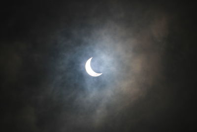 Low angle view of moon against sky at night