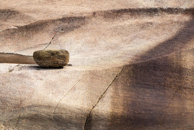 High angle view of stones on rock