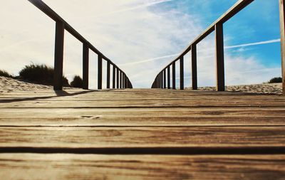 Surface level of bridge against sky