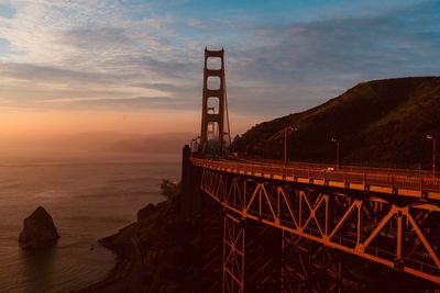 Golden gate bridge over sea against sky