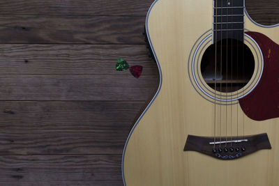 High angle view of guitar on table