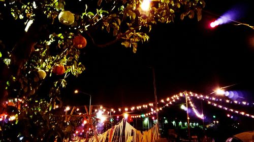 Illuminated street light at night