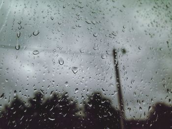 Full frame shot of wet window in rainy season