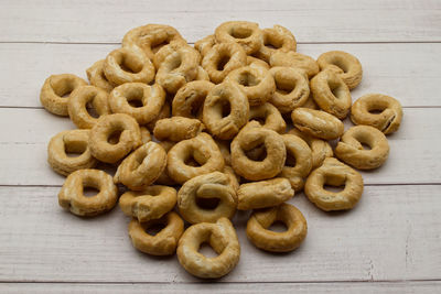 Taralli alla pugliese with extra virgin olive oil. traditional italian snack taralli