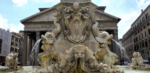 Low angle view of statue against sky