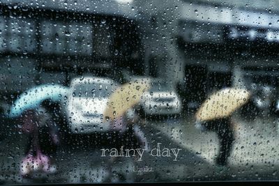 Close-up of rain drops on window