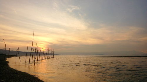 Scenic view of sea at sunset