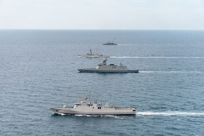 Nautical vessel on sea against sky