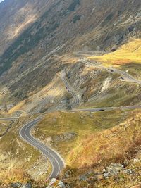 High angle view of road amidst mountain