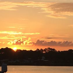 Scenic view of sunset over sea