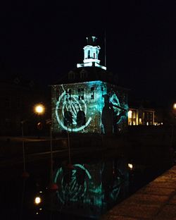 Illuminated lamp post at night