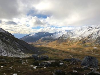 Scenic view of snowcapped mountains against sky