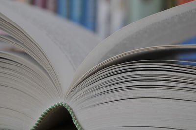 Close-up of open book on table