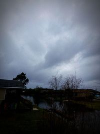 Storm clouds over house