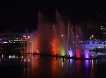 View of illuminated buildings at night