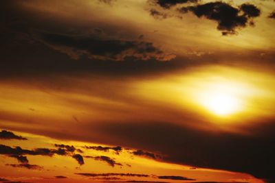 Scenic view of cloudy sky at sunset