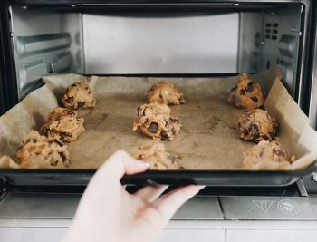 Close-up of hand holding cookies