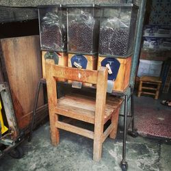 Empty chairs and tables in abandoned building