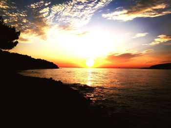 Scenic view of sea at sunset