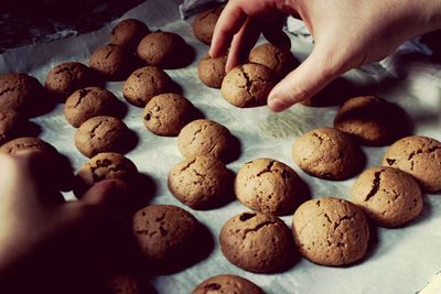 Close-up of hand holding cookies