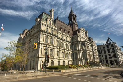 View of building against cloudy sky