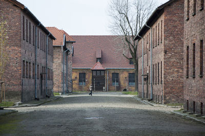 Street amidst buildings against sky