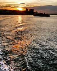 Scenic view of sea at sunset