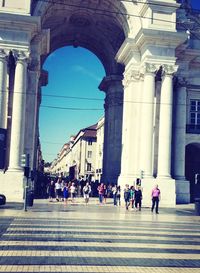 Tourists in front of historic building