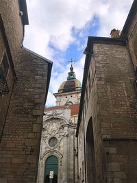 Low angle view of bell tower against sky