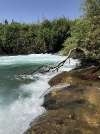 Scenic view of river against sky