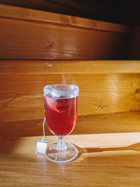 Close-up of wineglass on table