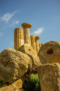 Low angle view of old ruin building against sky