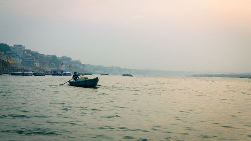 Nautical vessel on sea against sky