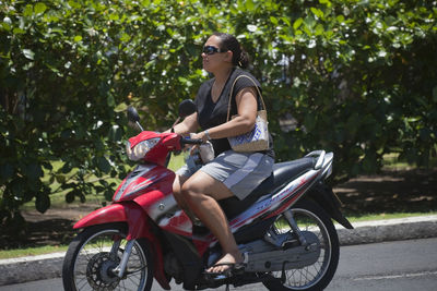 Woman riding motorcycle